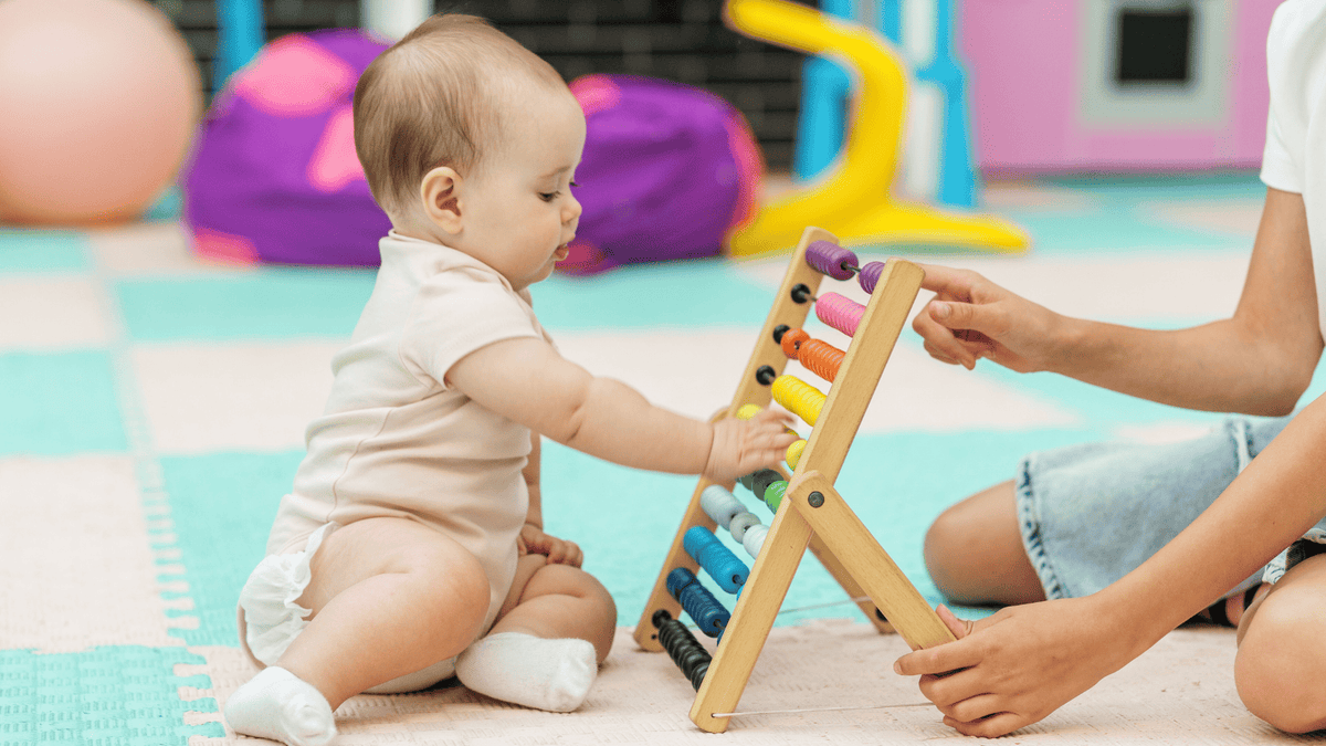6 month old baby playing toys