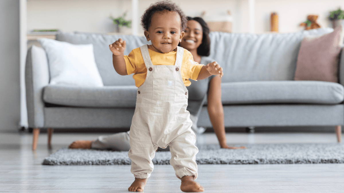 10 month old baby standing